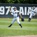 Saline center fielder Angel Schilke throws after catching a ball during the game against Mattawan on Tuesday, June 11. Daniel Brenner I AnnArbor.com